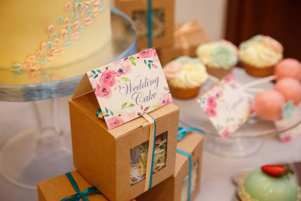 istock Wedding cake and other sweets on candy bar. Catering service at wedding day 908755688