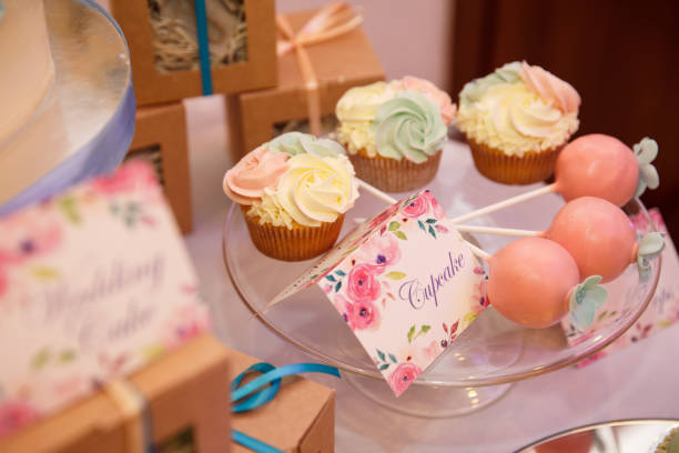 istock Wedding cake and other sweets on candy bar. Catering service at wedding day 908755872