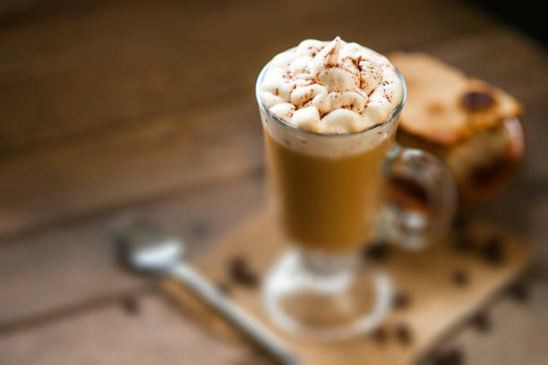 istock Glass of cup coffee with cream 908759388
