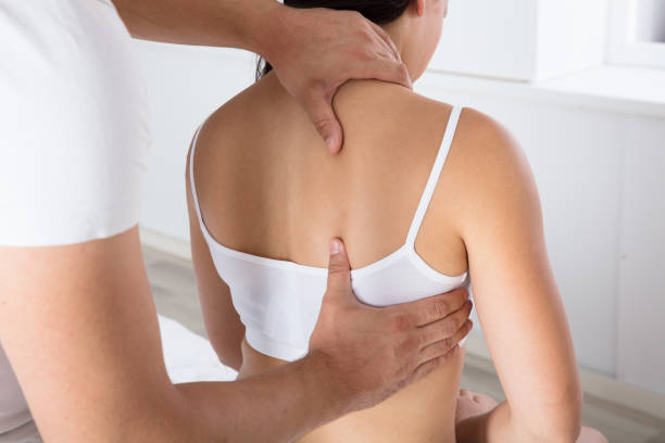 istock Woman Receiving Back Massage 908765156