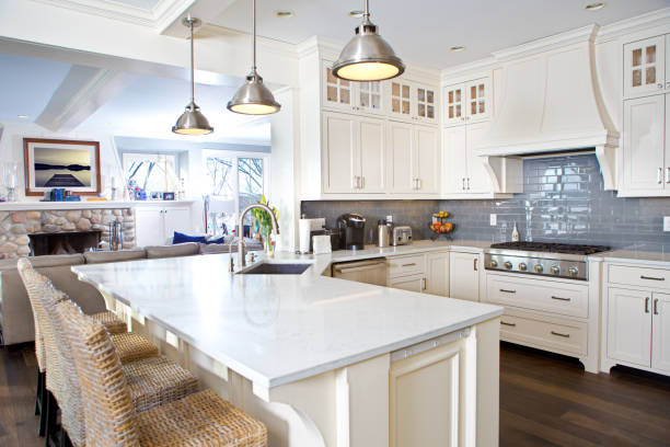 modern kitchen design with open concept and bar counter - quartz imagens e fotografias de stock