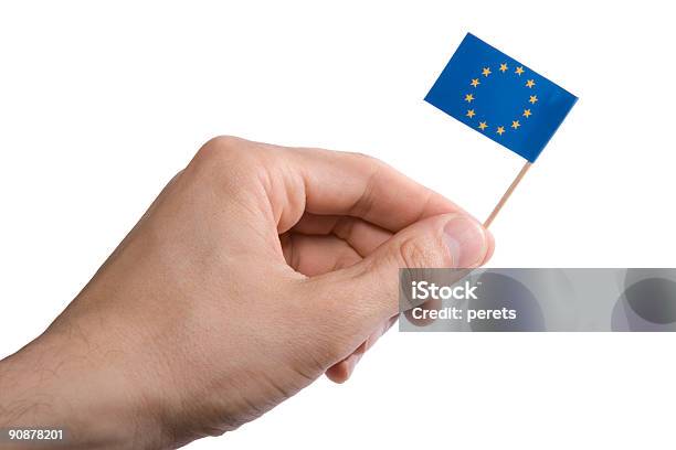 Photo libre de droit de Tenant Le Drapeau De Lue banque d'images et plus d'images libres de droit de De petite taille - De petite taille, Drapeau, Fond blanc