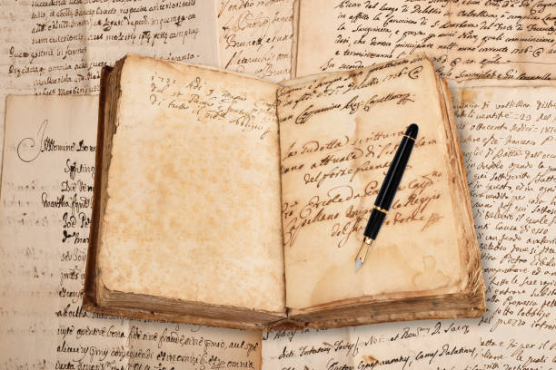 istock old copybook with fountain pen 908785230