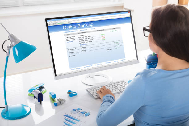 istock Businesswoman Doing Online Banking 908787526