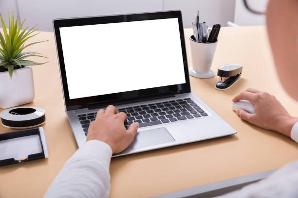 istock Businesswoman Using Laptop At Office Desk 908793386