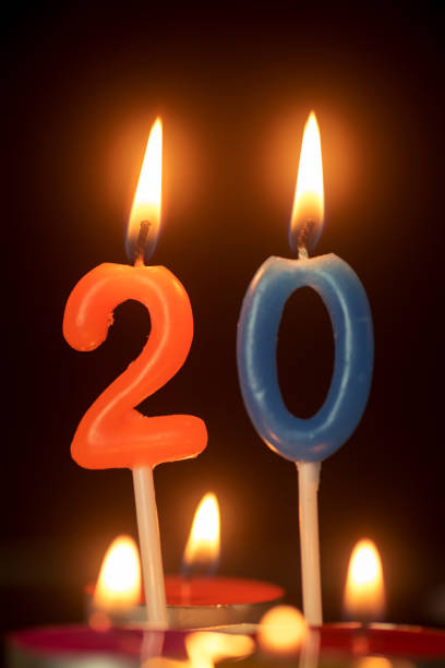 istock Close-Up Of Illuminated Birthday Candles 908794066