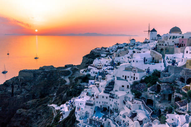 istock Houses By Sea During Sunset At Santorini 908799630