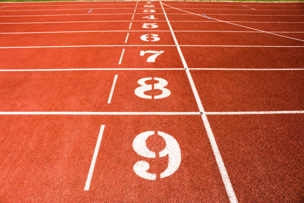 istock High Angle View Of Numbers On Running Track 908800598