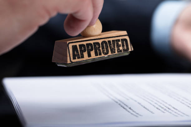 istock Businessperson Stamping On Approved Contract Form 908800910