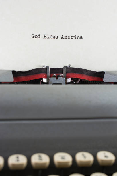 istock Retro typewriter with saying God Bless America 908813684