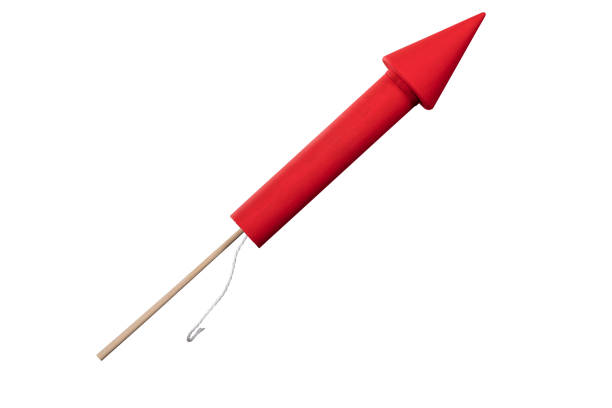 Red Rocket Firework Close-up Of Red Rocket Firework Isolated Over White Background firework explosive material photos stock pictures, royalty-free photos & images