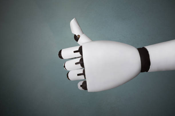 Close-up Of Robot's Hand Showing Thumb Up Sign