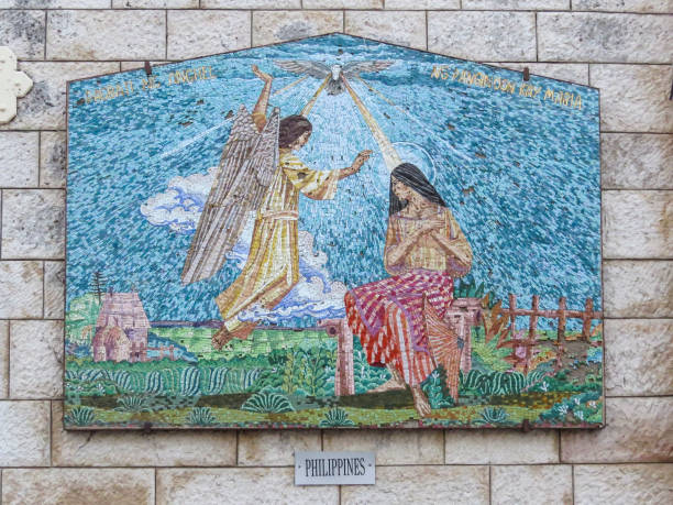 The Basilica of the Annunciation, Nazareth, Israel Nazareth, Israel - December 27, 2017: Mosaic in The Basilica of the Annunciation. The church marks the site where the Archangel Gabriel announced the future birth of Jesus to Mary tomb of the virgin mary in jerusalem stock pictures, royalty-free photos & images