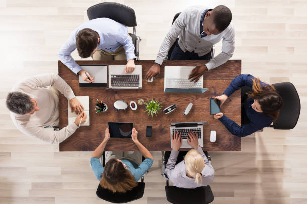 istock Group Of Businesspeople Working In Office 908827816