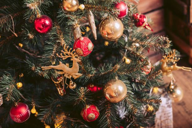 istock Christmas tree decorated with retro toys 908827970