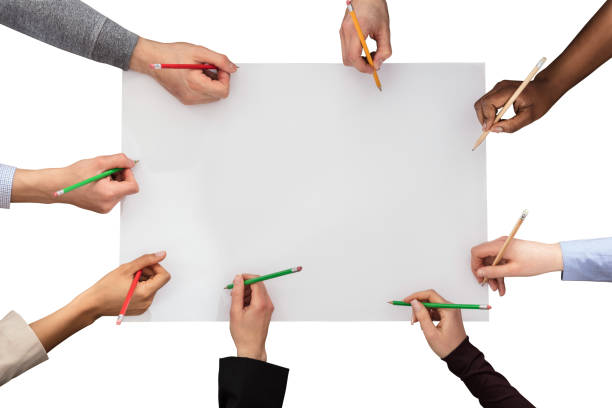 istock High Angle View Of Businesspeople Hand With Pencil 908830614