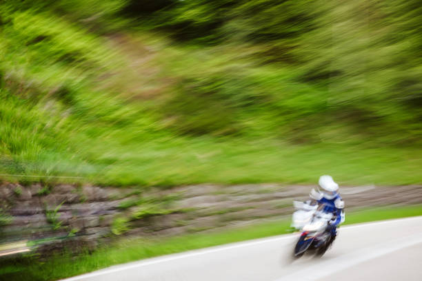 istock Motorcyclist driving fast on the highway 908833756