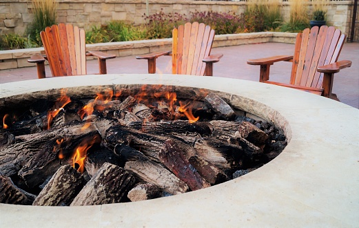 Adirondack chairs by the fire pit