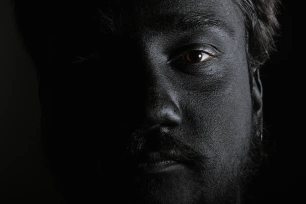 istock Portrait of a man with creative art make-up 908844194