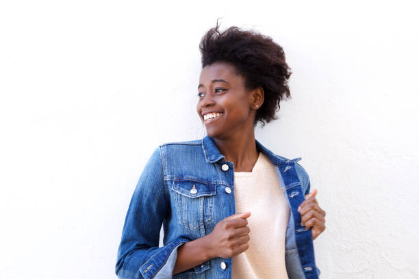 istock Cool young african woman with denim jeans jacket 908850906