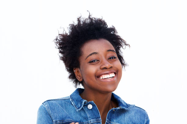 istock Cheerful african woman on white background 908850948