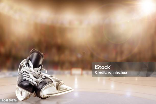 Ice Hockey Skates In Arena Rink With Copy Space Stock Photo - Download Image Now - Ice Hockey, Hockey, Ice Skate