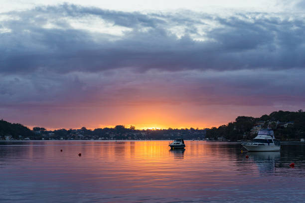 istock Sunset, sunrise landscape with yachts on tropical lagoon 908871036