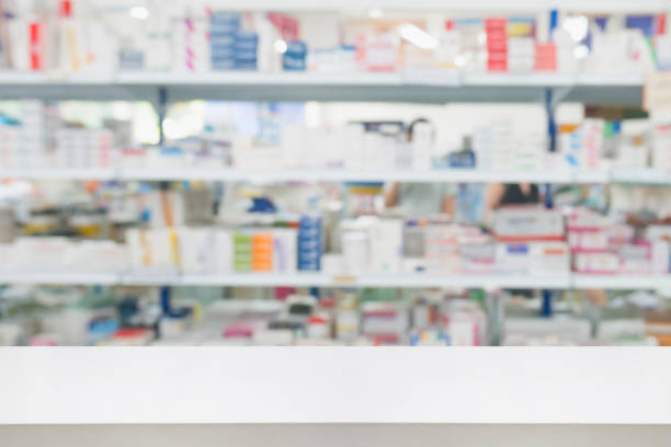 istock pharmacy drugstore shop interior blur background 908874426
