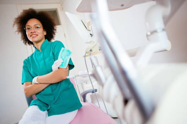 istock Young female dentist in her ordination 908874660