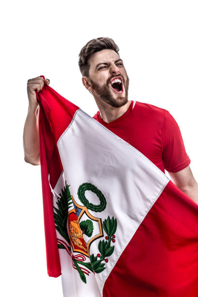 istock Peruvian male athlete / fan celebrating on white background 908875240