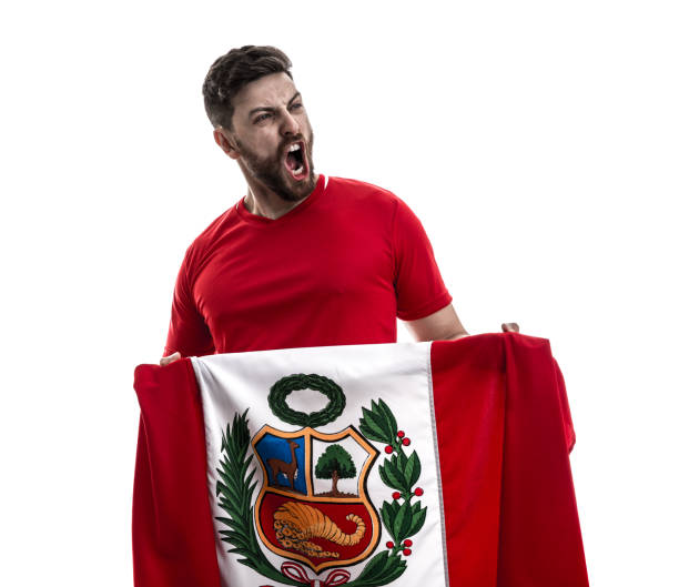 istock Peruvian male athlete / fan celebrating on white background 908875260
