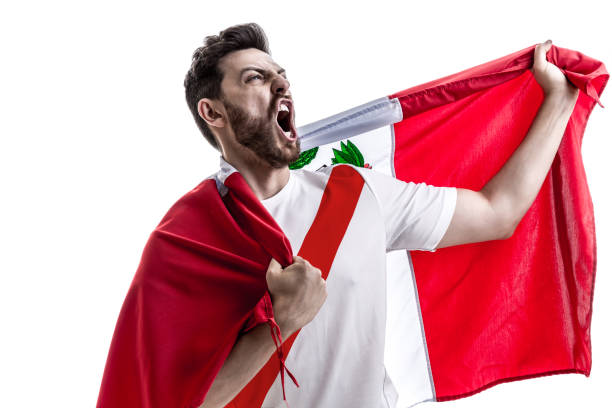 istock Peruvian male athlete / fan celebrating on white background 908875290