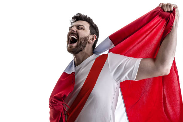 peruvian male athlete / fan celebrating on white background - fan sport football male imagens e fotografias de stock