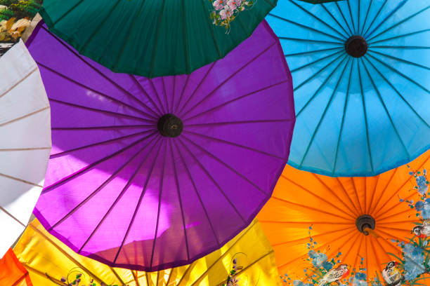 istock Umbrellas  / paper umbrellas colorful : Colorful background 908878068