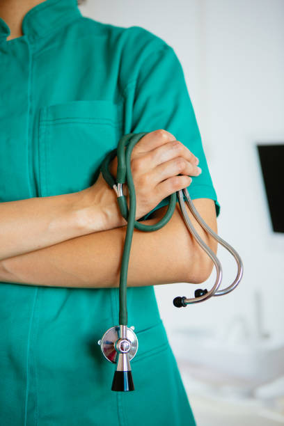 istock Close up of doctor holding stethoscope 908881316