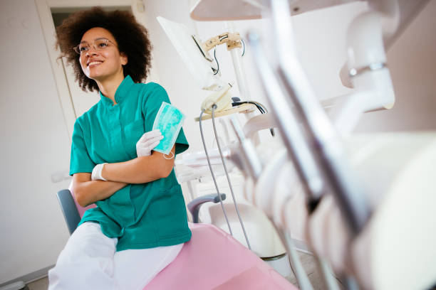 istock Young female dentist in her ordination 908884700