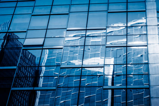 istock Detail glass building background 908893874