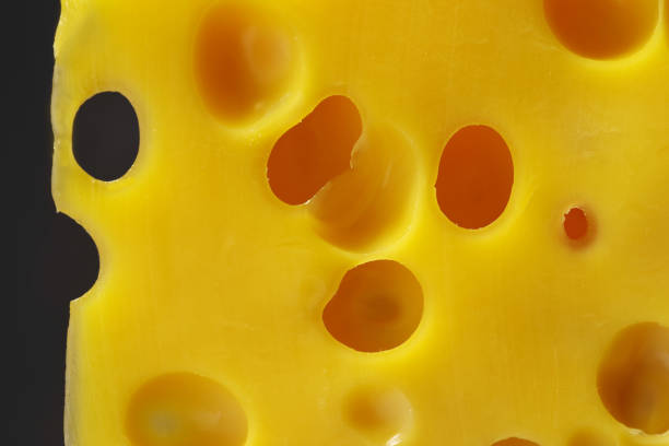istock Texture of cheese close-up. 908900404