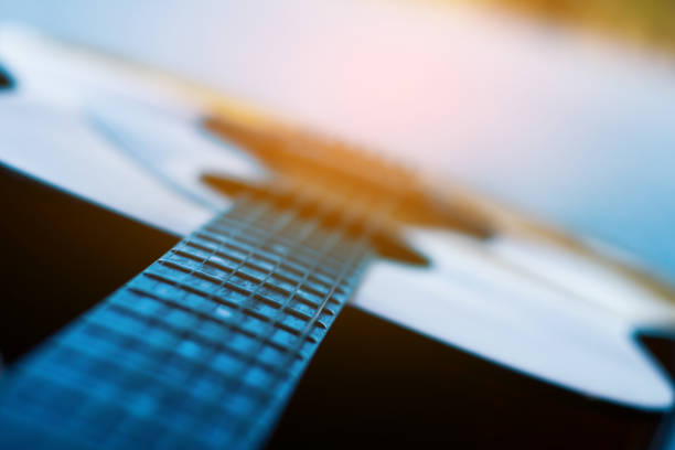 istock Guitar musical instrument closeup. 908900600