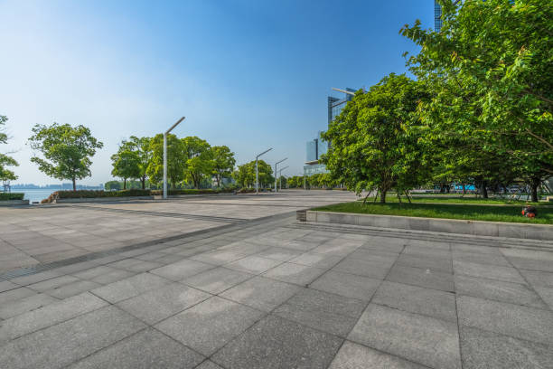istock Empty pavement and the city financial district 908904254