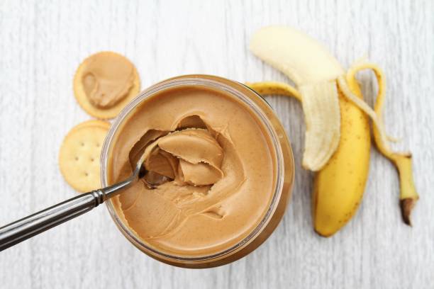 istock Peanut butter snack with banana and crackers 908906986