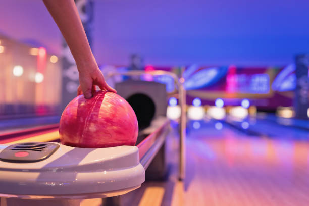 istock Teennnager holding bowling ball. 908917660
