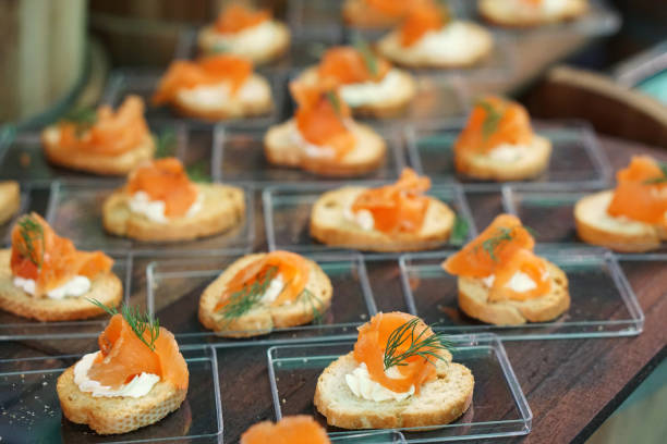 istock Mini Canapes - Sliced bread with cream cheese, smoked salmon and fresh dill. 908917768