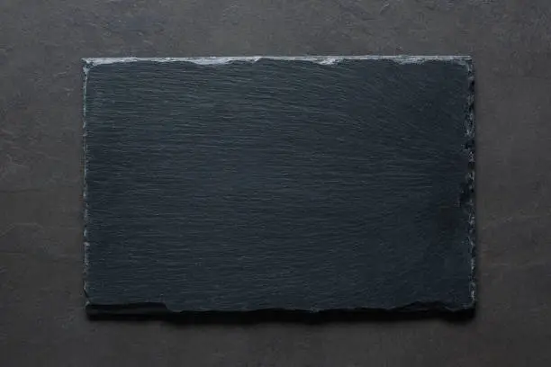 Photo of Black slate background top view