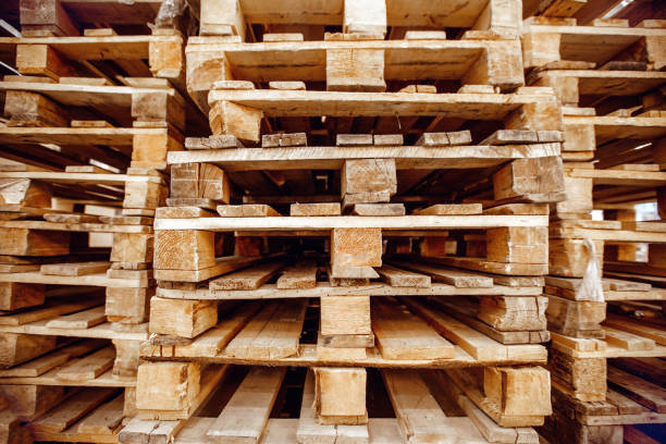 istock Wooden pallets stacked a warehouse 908924432