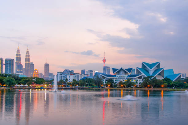 istock modern buildings near water in modern city 908924898