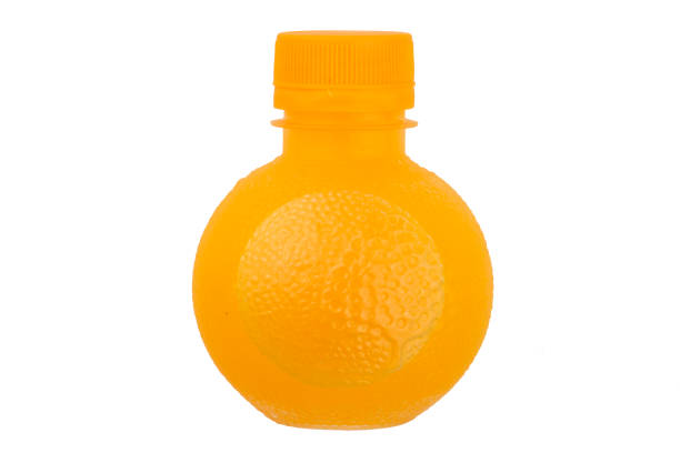 istock Orange juice in a plastic bottle. Bottle Orange Shape. 908933276