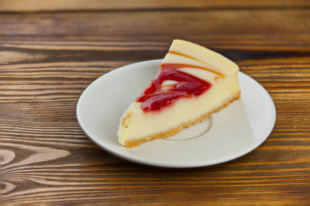 istock delicious cheesecake with strawberries on  plate 908943774
