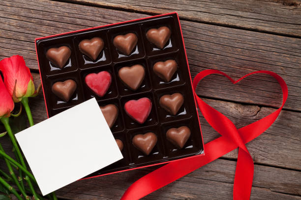 istock Valentines day with red roses and chocolate 908944172
