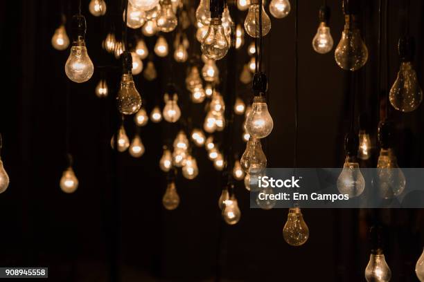 Hanging Tungsten Lamp Bulbs Stock Photo - Download Image Now - Light Bulb, Lighting Equipment, Illuminated